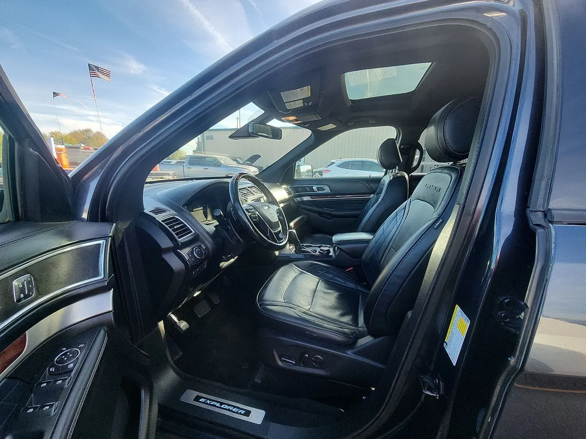 Interior of the 2017 Ford Explorer Platinum with black quilted leather seats, a sunroof and Platinum seat embroidery