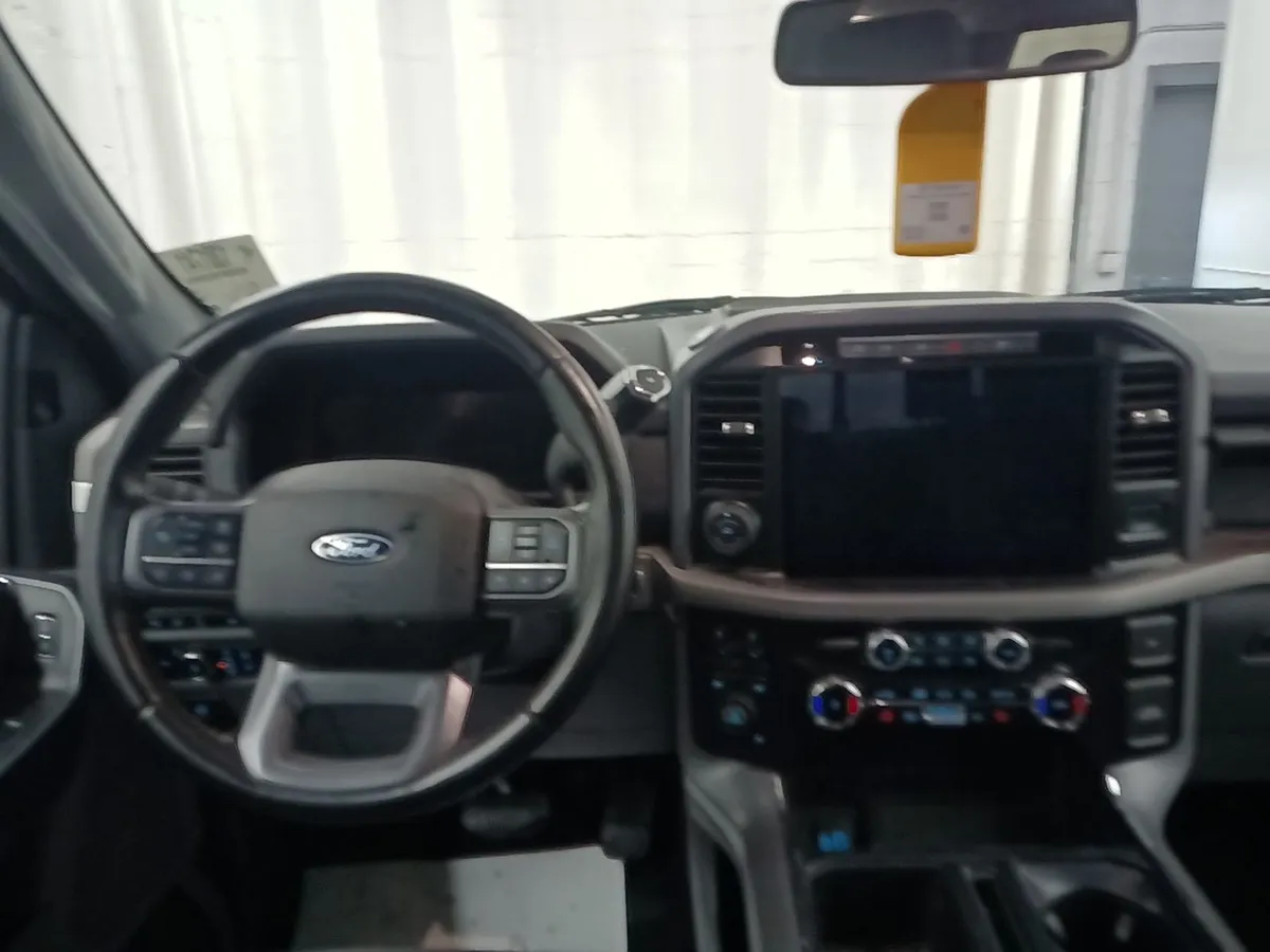 Dashboard of the 2024 Ford F-150 XLT showing the steering wheel and the large center touchscreen