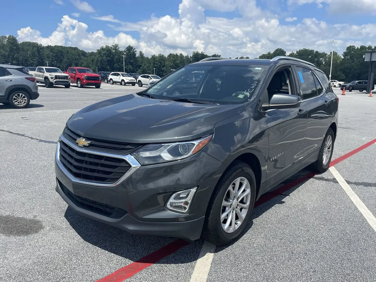 2018 Chevrolet Equinox LT in dark gray, front three-quarter view on the auction lot, clean paint and alloy wheels