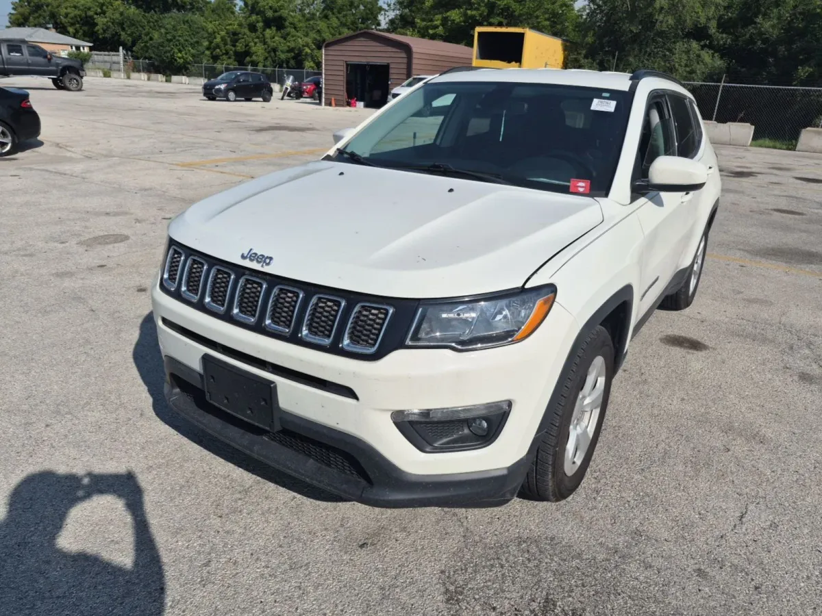 2020 Jeep Compass Latitude in white, front three-quarter view on the auction lot