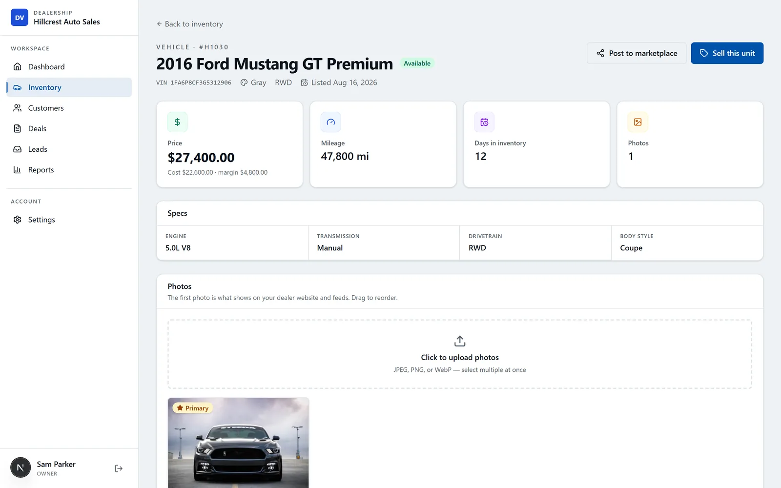 DealerVLO vehicle detail page showing price with cost and margin, mileage, days in inventory, specs, and photo manager